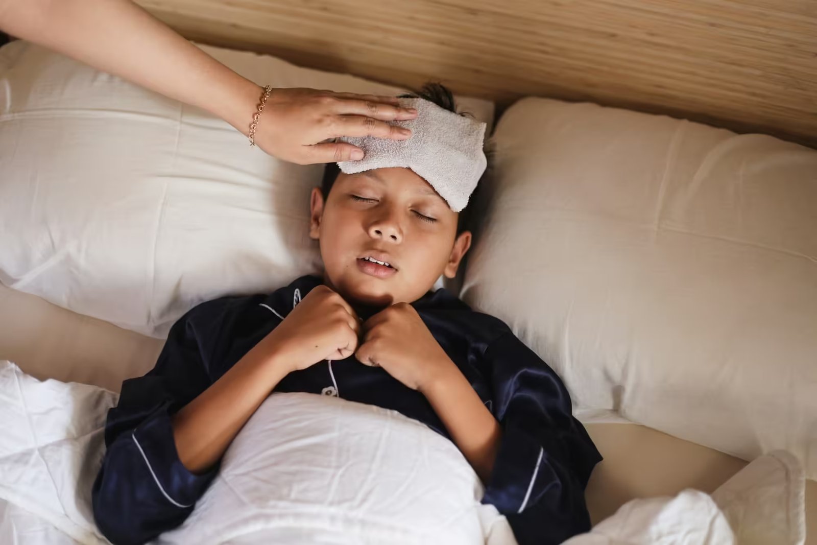 Asian baby boy get sick, high fever.