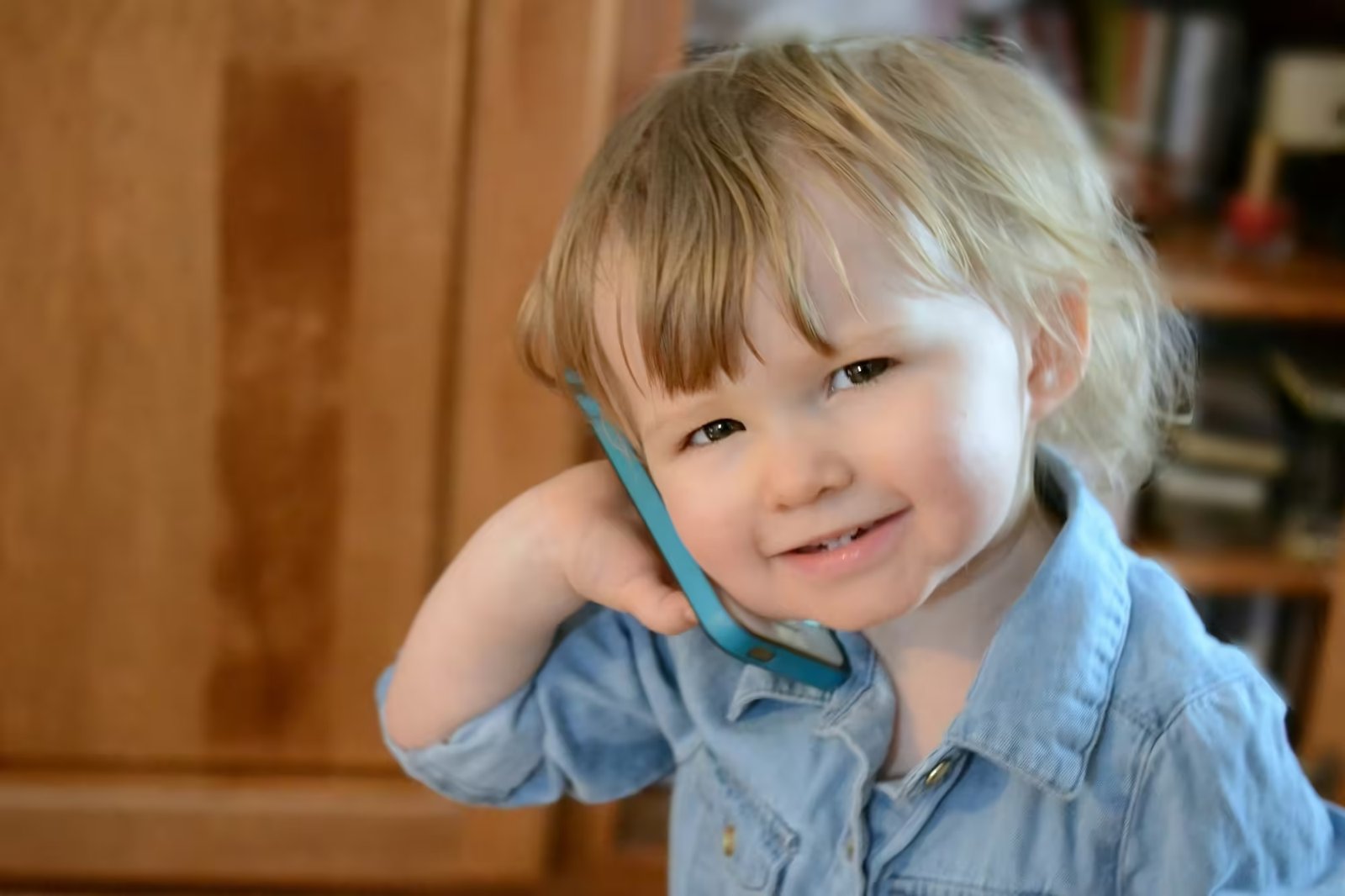 Smiling Little Girl Toddler Child Talking On A Cellphone